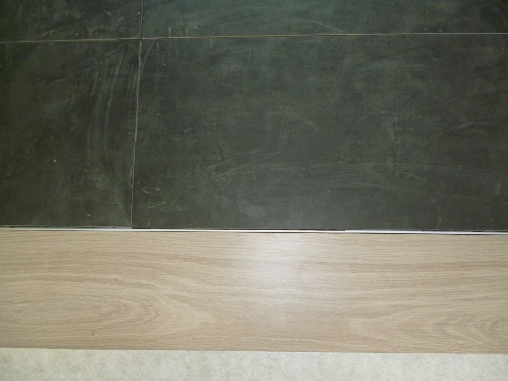 Jonction carrelage parquet salle de bain