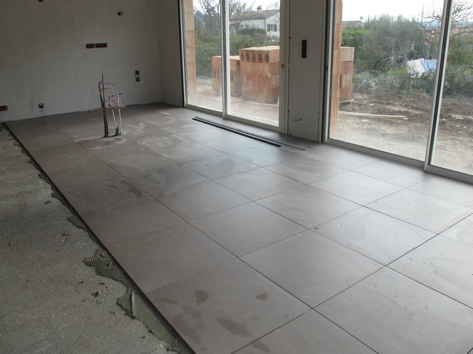 Carrelage brillant sans joint