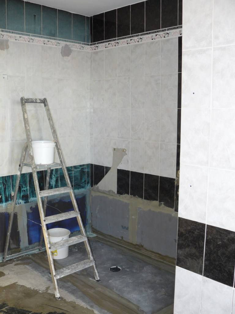 Carrelage salle de bain vannes