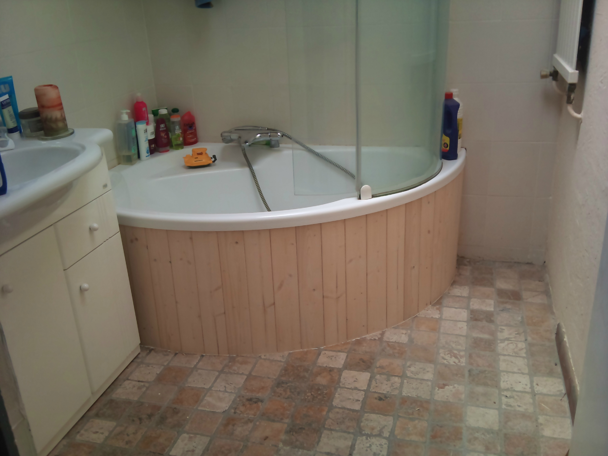 Carreler baignoire d'angle