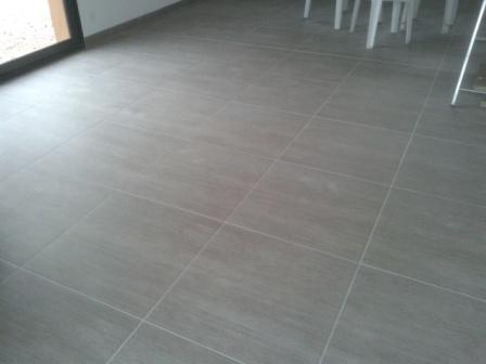 Carrelage dans maison ossature bois